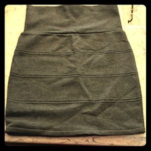 A grey bodycon skirt